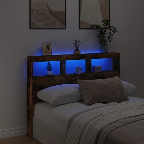 Hoofdbordkast met LED-verlichting 140x17x102 cm gerookt eiken